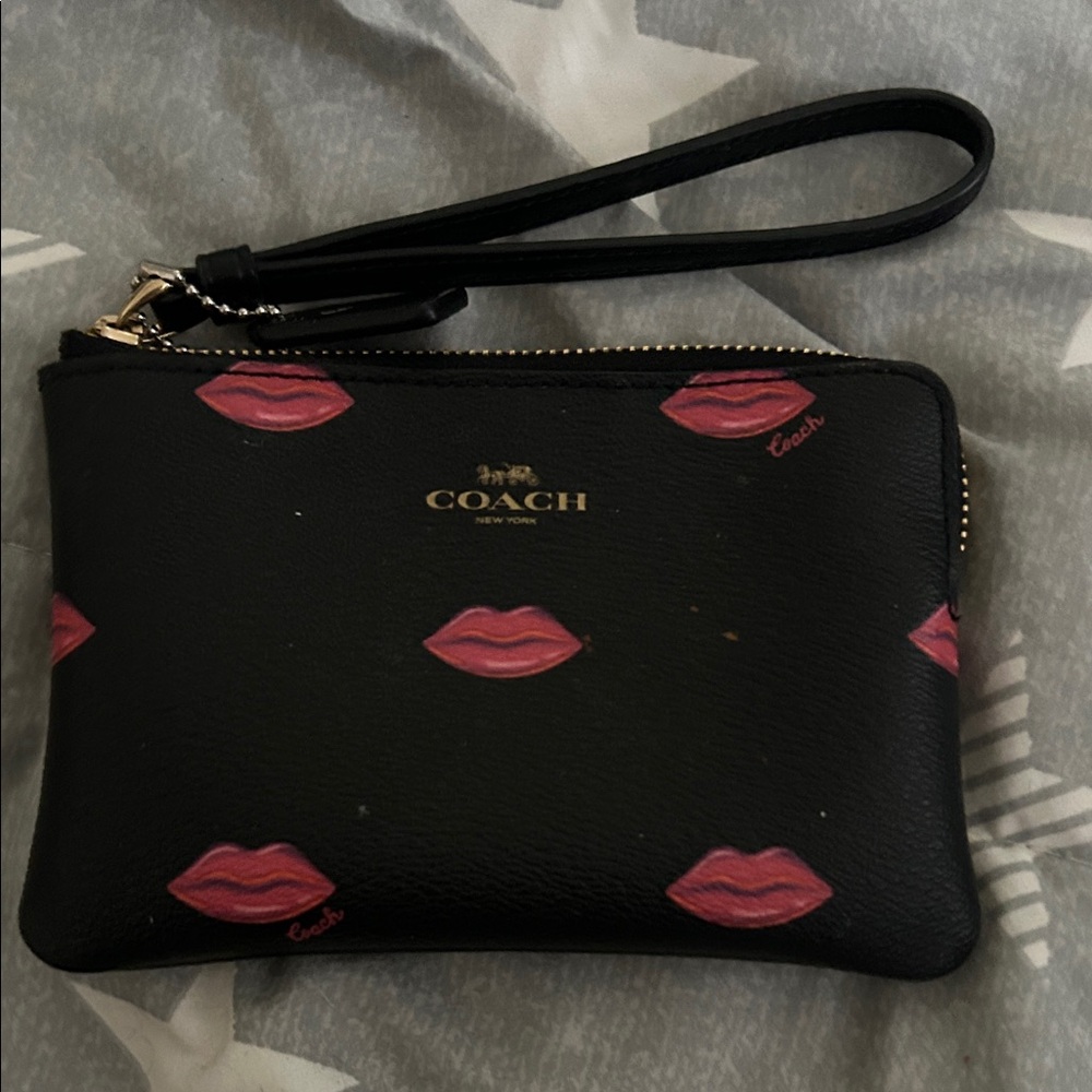 Coach Black Wristlet with Pink Lip Motif
